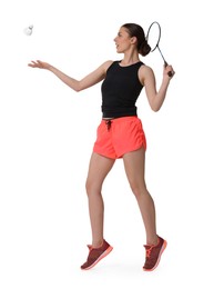 Photo of Young woman playing badminton with racket and shuttlecock on white background