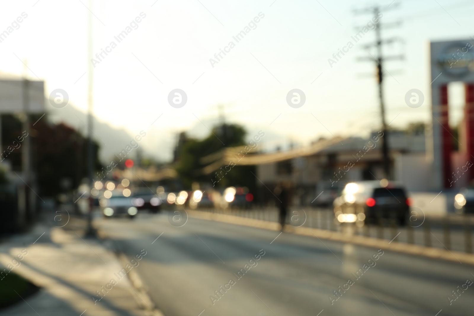 Photo of Blurred view of road with cars, bokeh effect