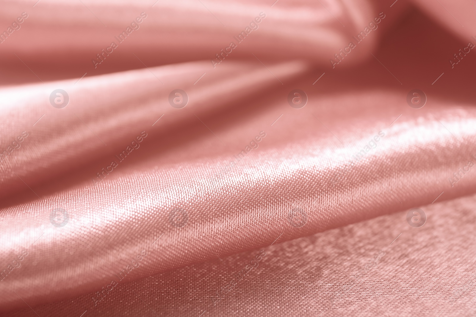 Photo of Texture of beautiful rose silk as background