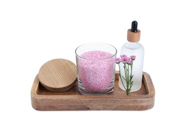 Photo of Glass container of pink sea salt, bottle with essential oil and beautiful chrysanthemum flowers isolated on white