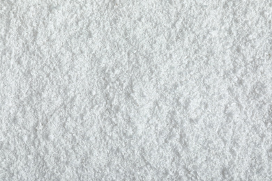 Pile of white snow as background, top view