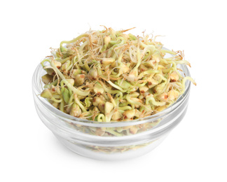 Photo of Glass bowl of sprouted green buckwheat isolated on white