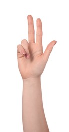 Playing rock, paper and scissors. Woman making scissors with her fingers on white background, closeup