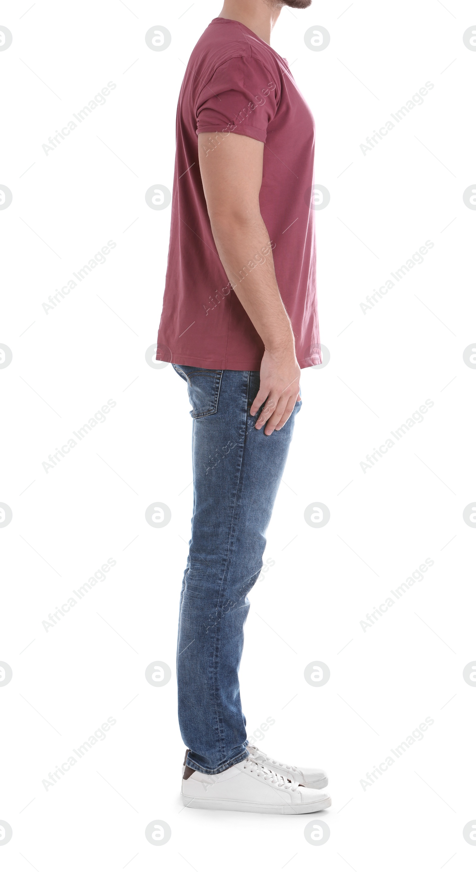 Photo of Young man on white background, closeup. Weight loss