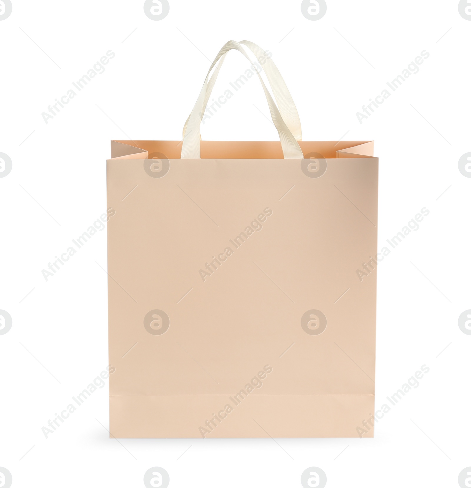 Photo of One paper bag isolated on white. Mockup for design