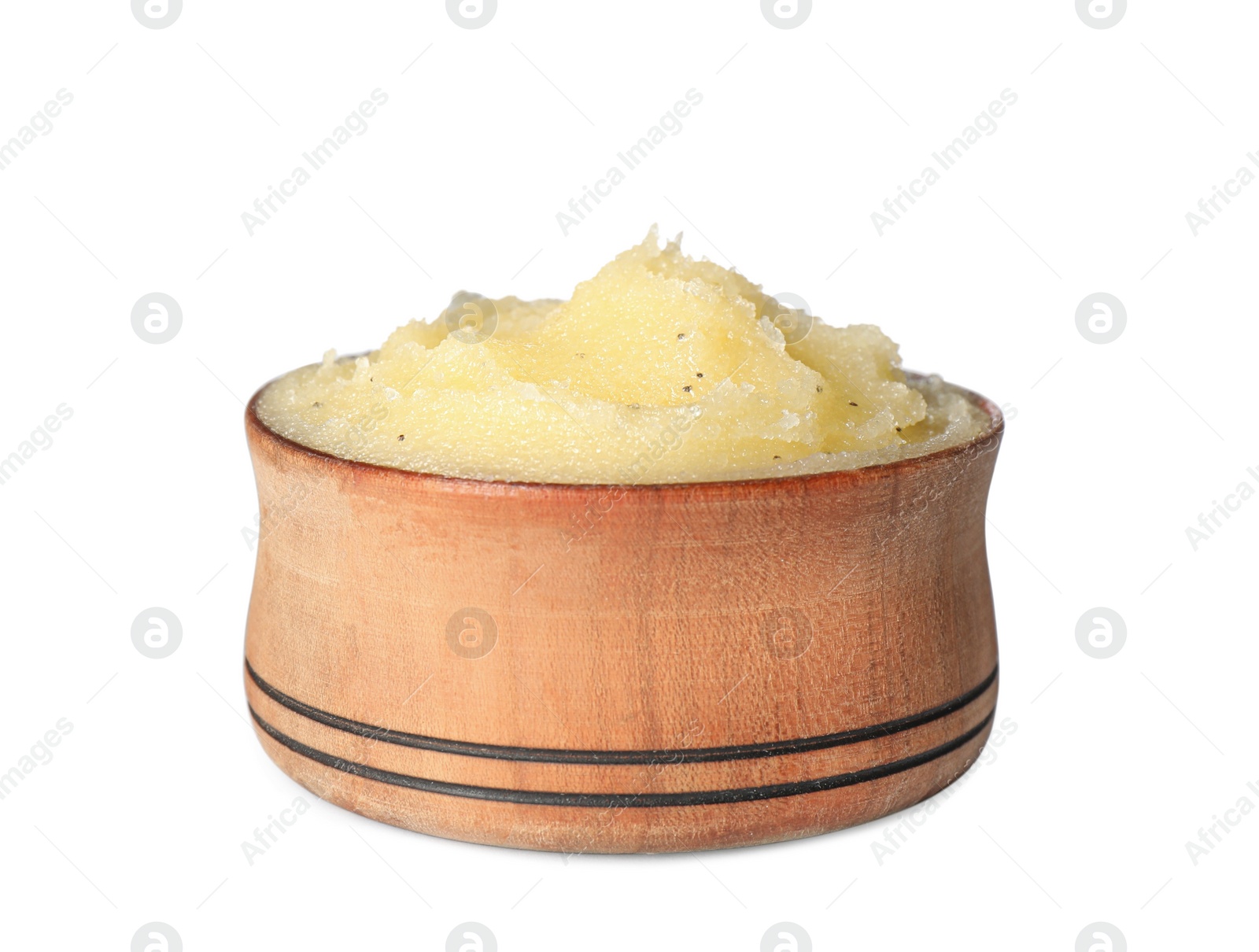 Photo of Wooden bowl of yellow body scrub isolated on white