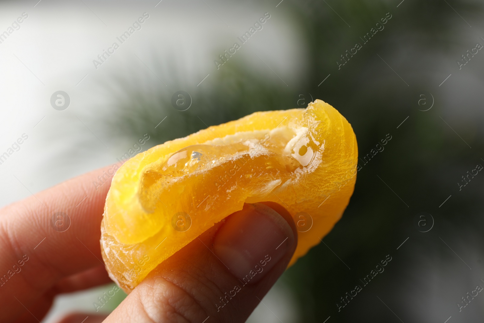 Photo of Woman holding delicious mochi, closeup. Japanese cuisine