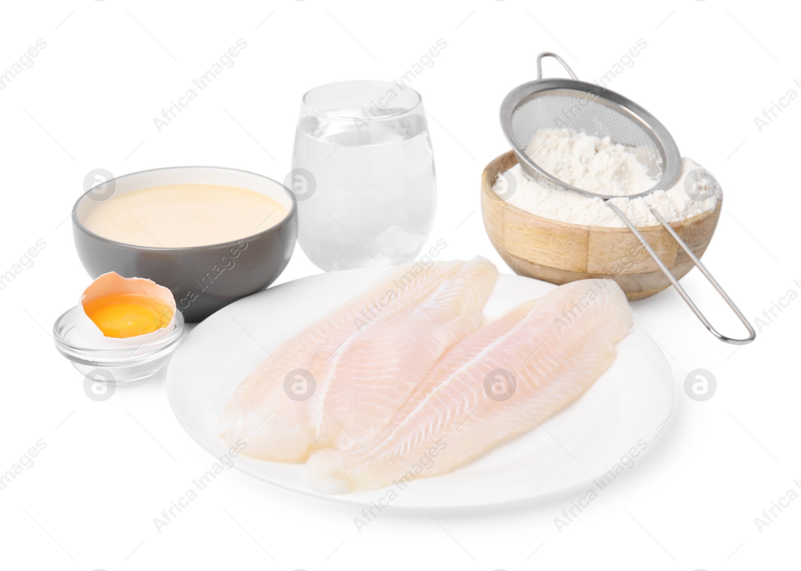 Photo of Cooking fish in soda water batter. Different ingredients isolated on white