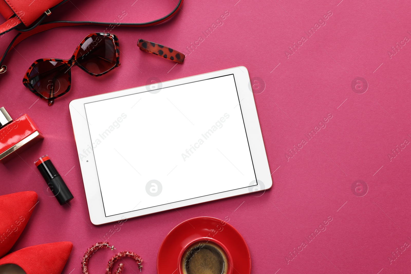 Photo of Flat lay composition with modern tablet on hot pink background. Space for text