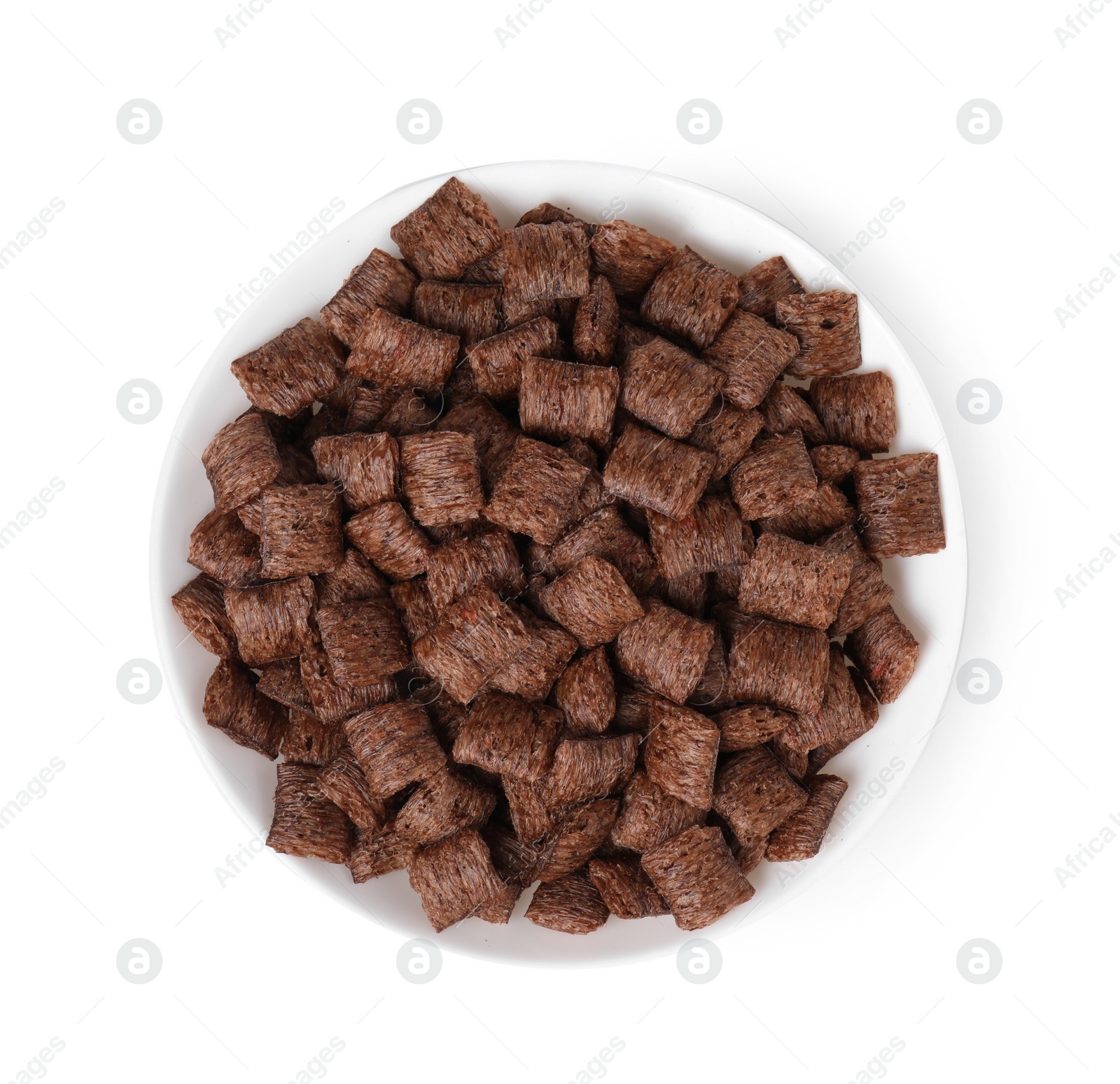 Photo of Chocolate cereal pads in bowl isolated on white, top view