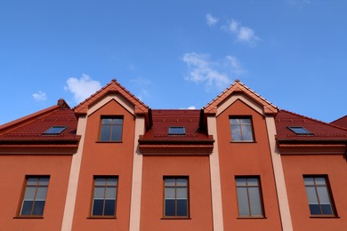Photo of Modern house against blue sky, low angle view