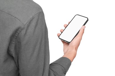 Man holding phone with blank screen on white background, closeup. Mockup for design