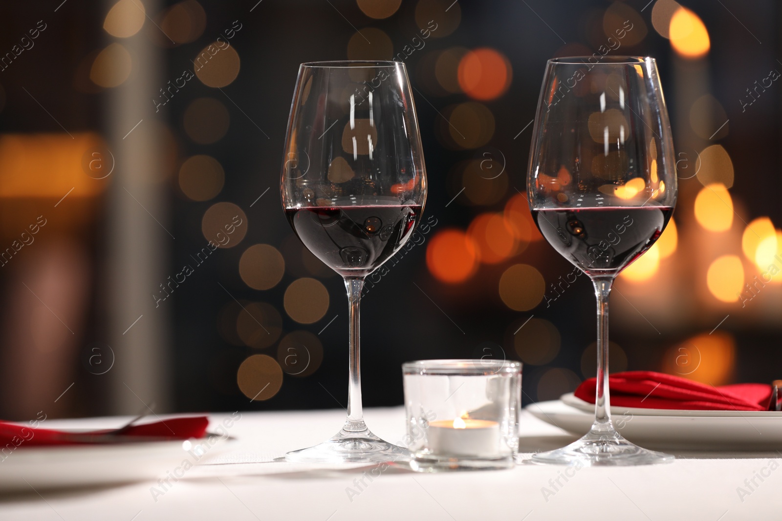 Photo of Table setting for romantic dinner in restaurant