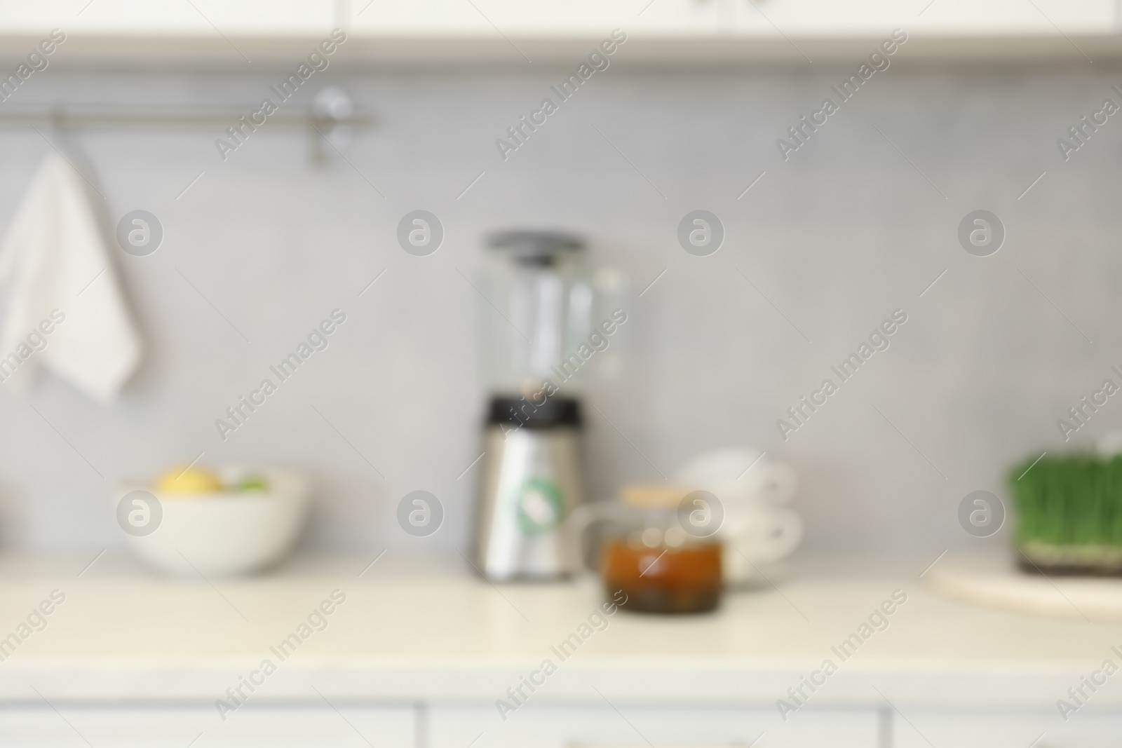 Photo of Blurred view of modern kitchen. Interior design