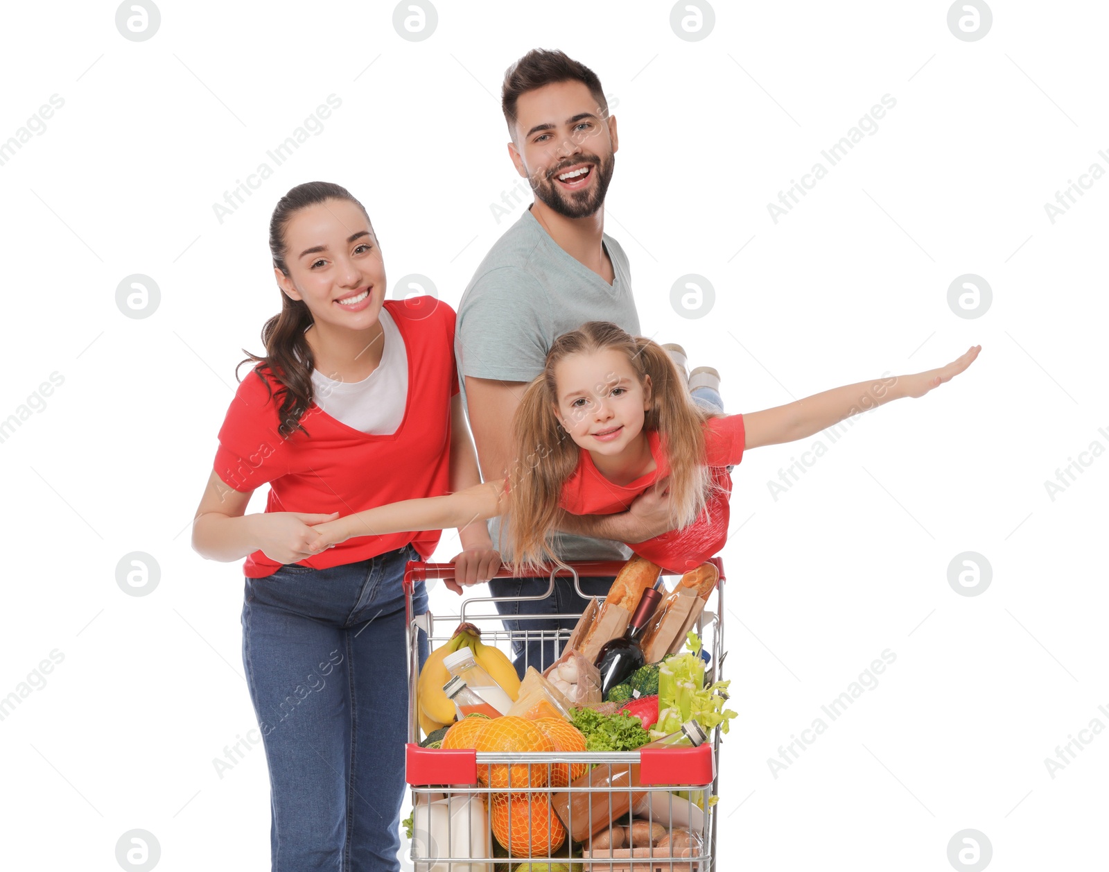 Photo of Happy family with shopping cart full of groceries on white background