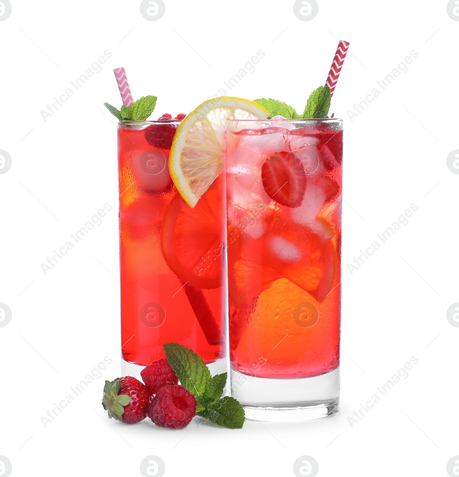 Photo of Different delicious lemonades made with soda water and ingredients on white background