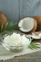 Organic coconut cooking oil on wooden table