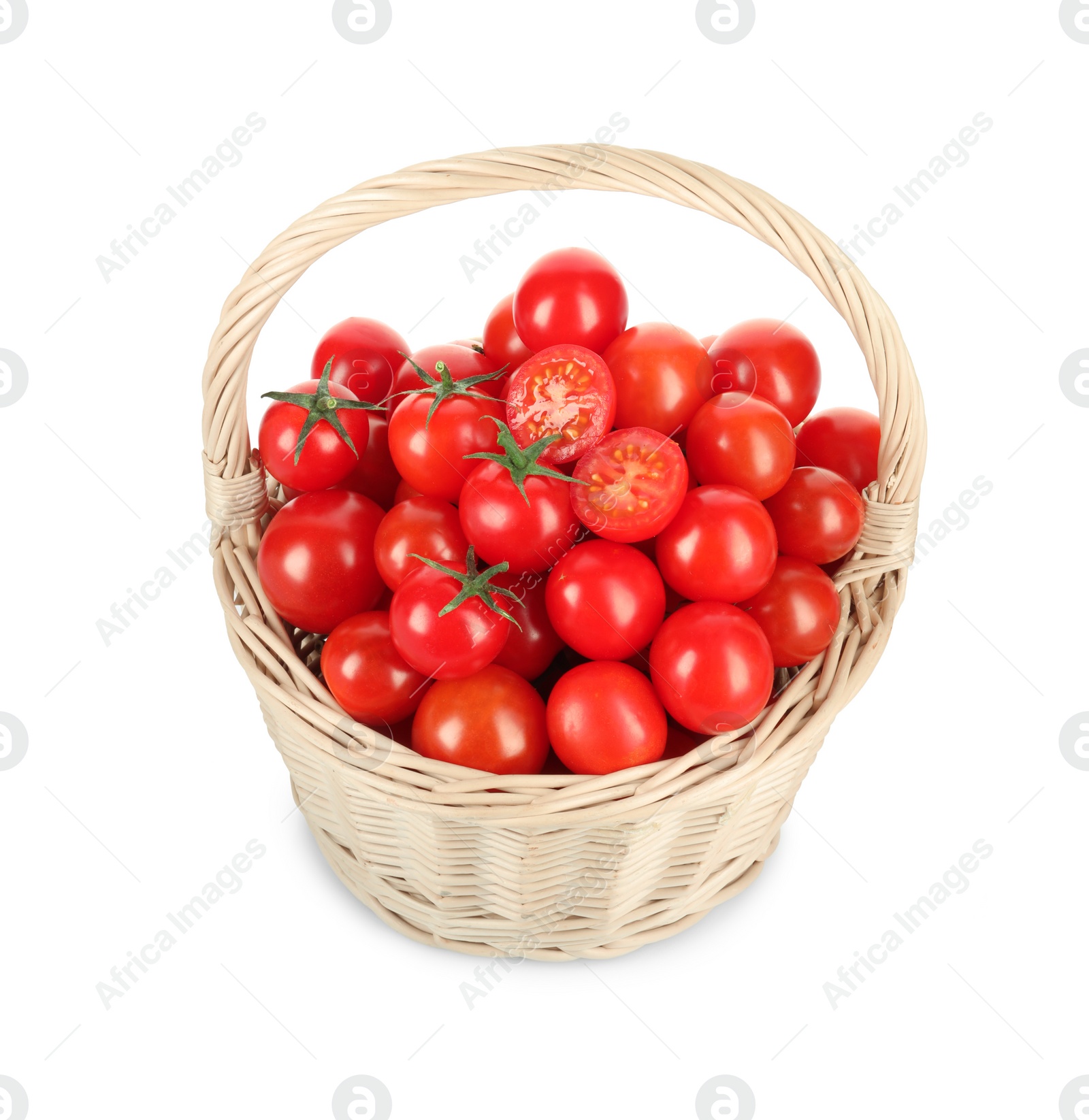 Wicker basket with fresh ripe cherry tomatoes isolated on white Photo of Wicker basket with fresh ripe cherry tomatoes isolated on white
