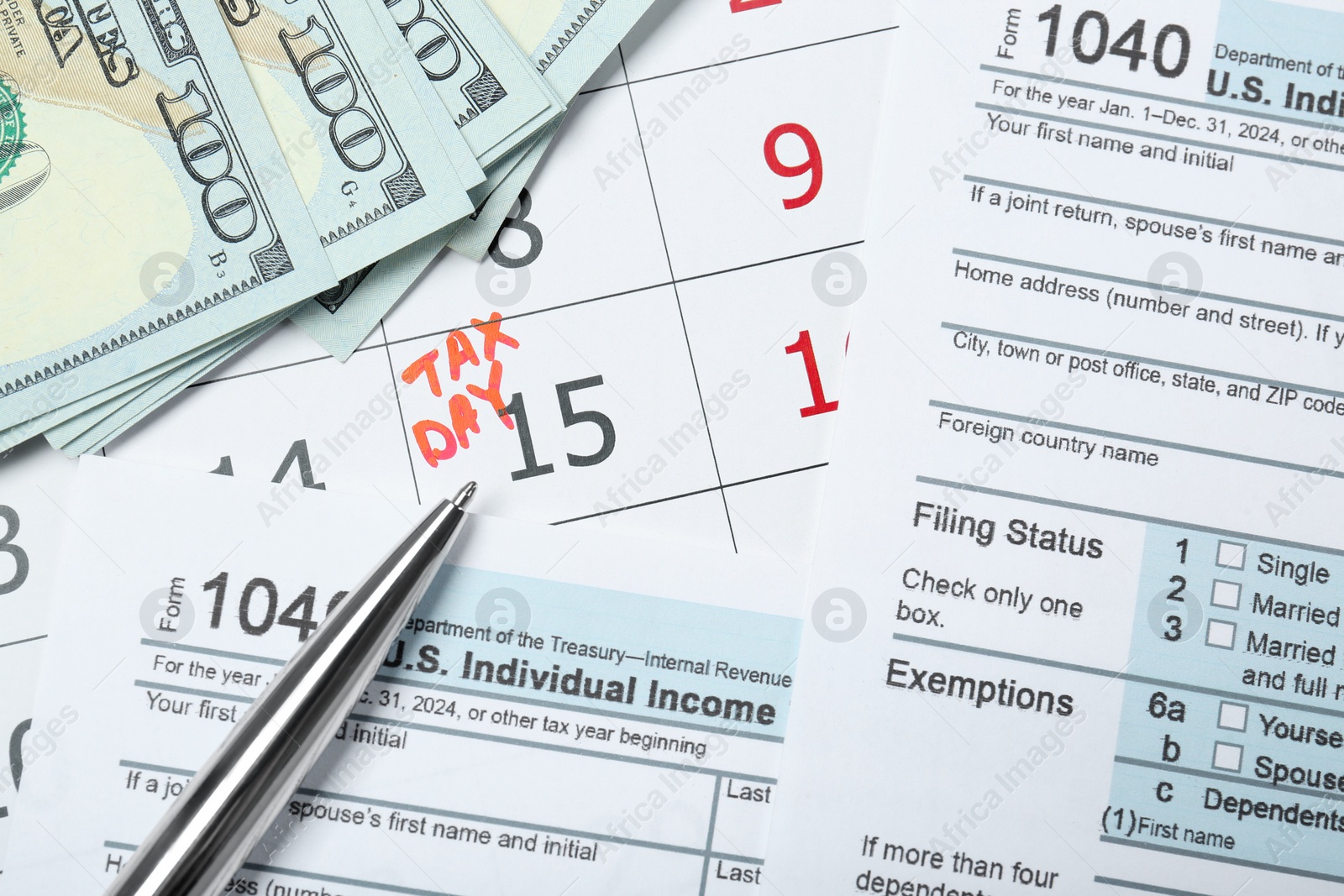 Photo of Tax day. Documents, dollar banknotes and pen on calendar with date reminder, flat lay