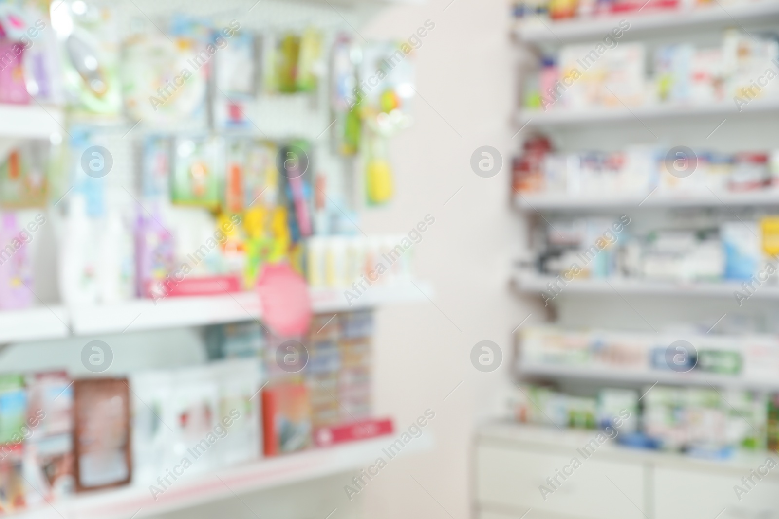 Image of Shelves with pharmaceuticals in drugstore, blurred view