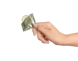 Woman holding condom on white background, closeup