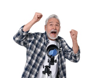 Excited senior astronomer with telescope on white background