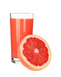 Photo of Tasty grapefruit juice in glass and half of fresh fruit isolated on white