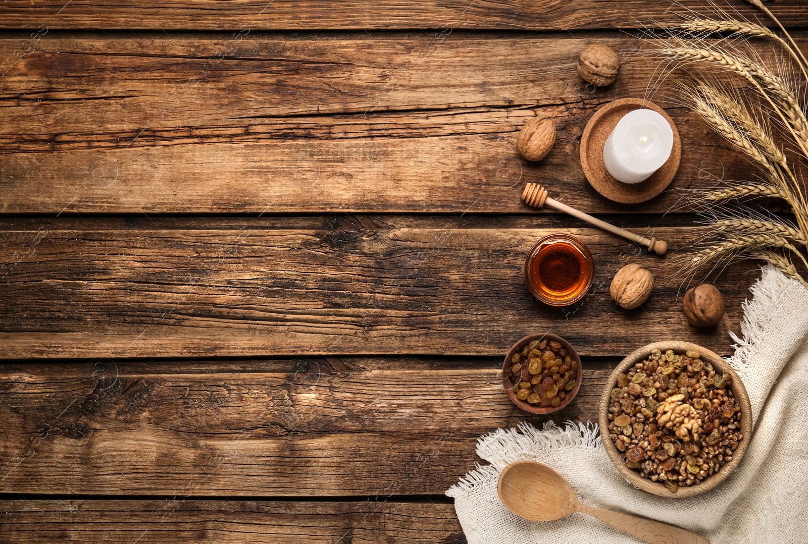 Photo of Traditional Christmas slavic dish kutia served on wooden table, flat lay. Space for text