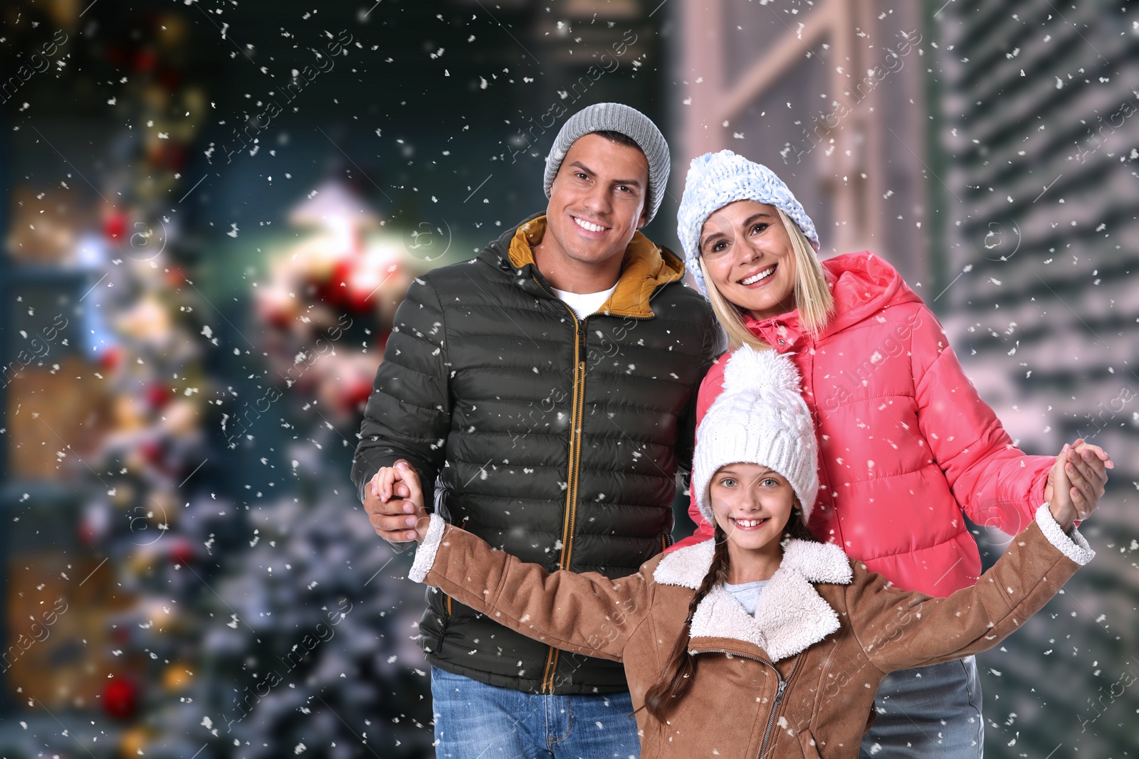 Image of Happy family spending time together at winter resort