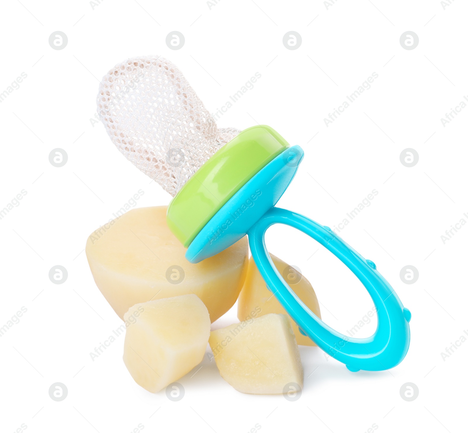 Photo of Empty nibbler and boiled potato on white background. Baby feeder