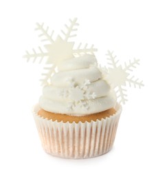 Tasty Christmas cupcake with snowflakes isolated on white