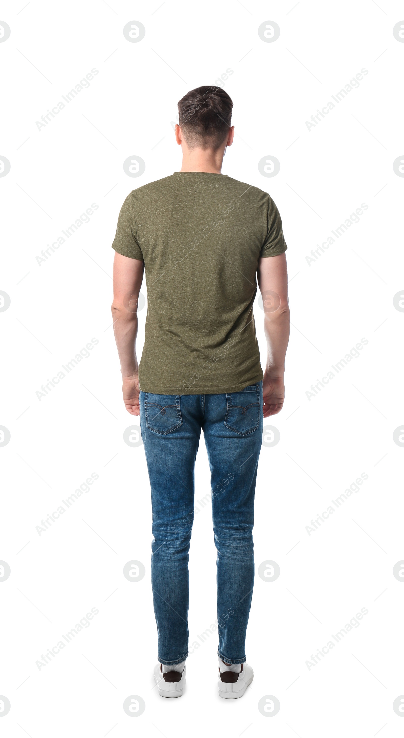 Photo of Young man in casual clothes posing on white background