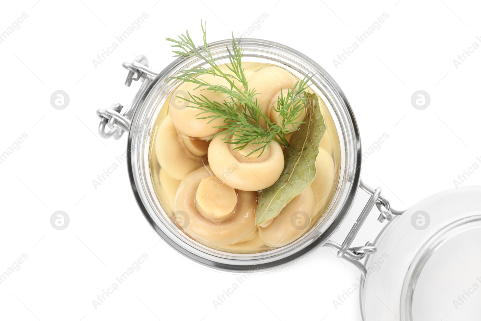 Photo of Jar with marinated mushrooms and dill isolated on white, top view