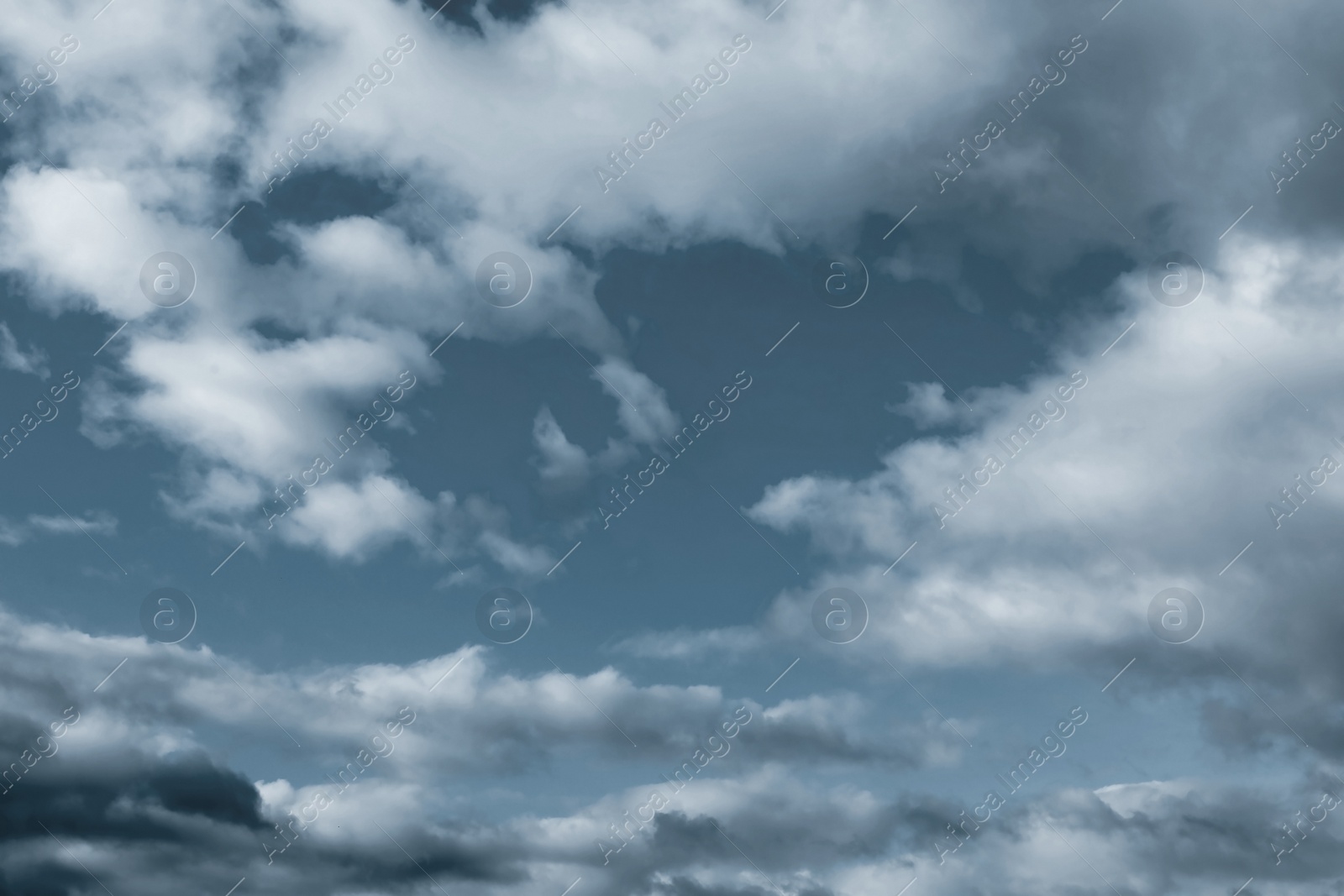 Image of Sky covered with rainy clouds. Stormy weather