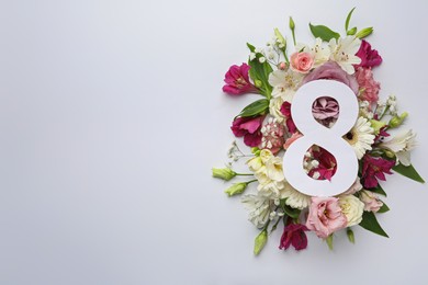 Photo of 8 March greeting card design with beautiful flowers on white background, flat lay and space for text. International Women's day