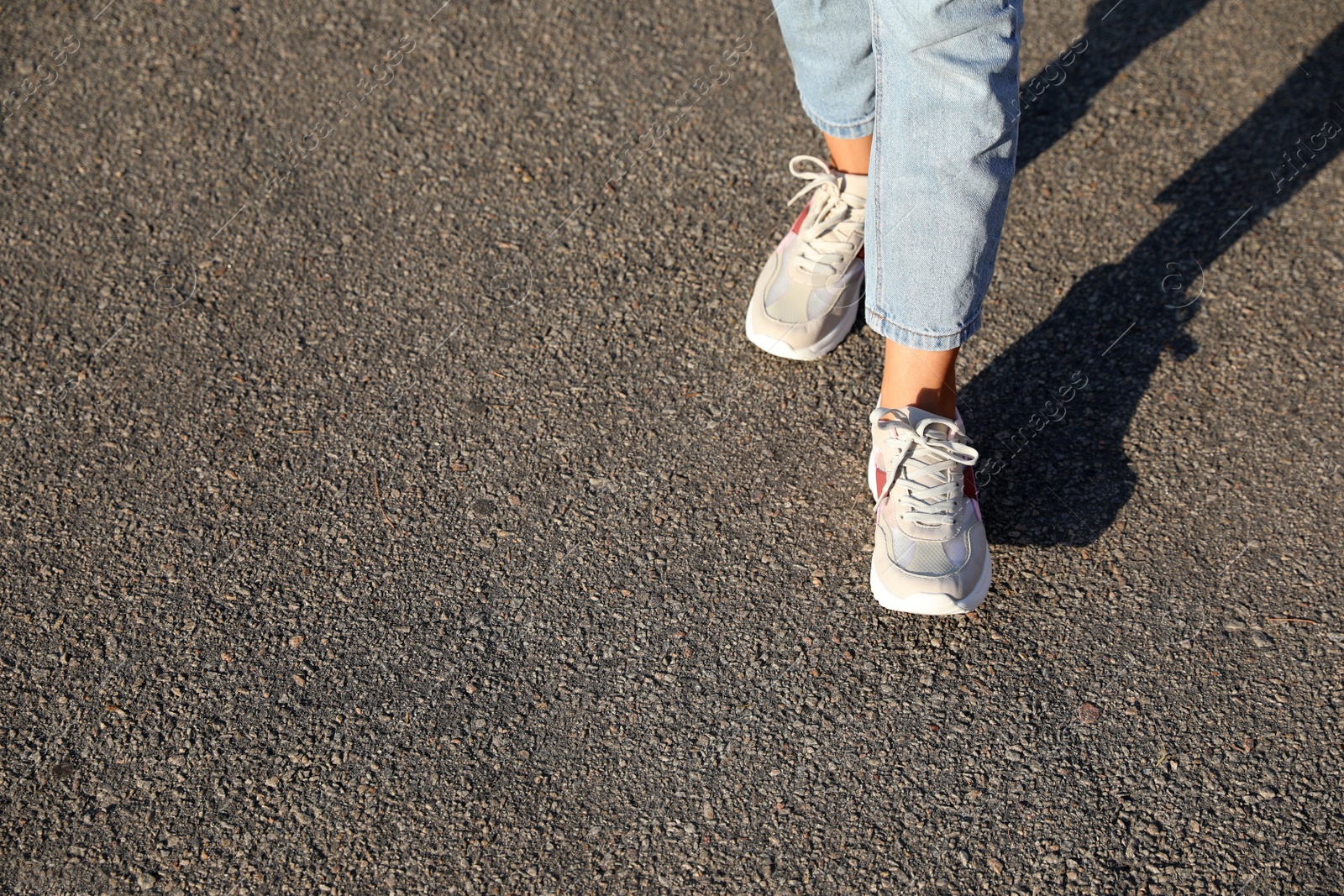 Photo of Woman walking outdoors, closeup with space for text. Choosing way concept.