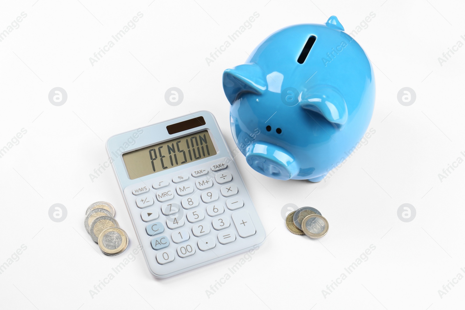Photo of Calculator, piggy bank and coins on white background. Retirement concept