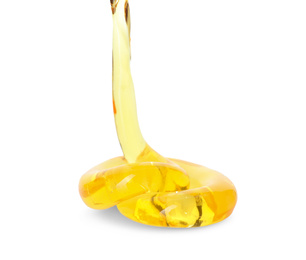 Photo of Flowing yellow slime on white background. Antistress toy