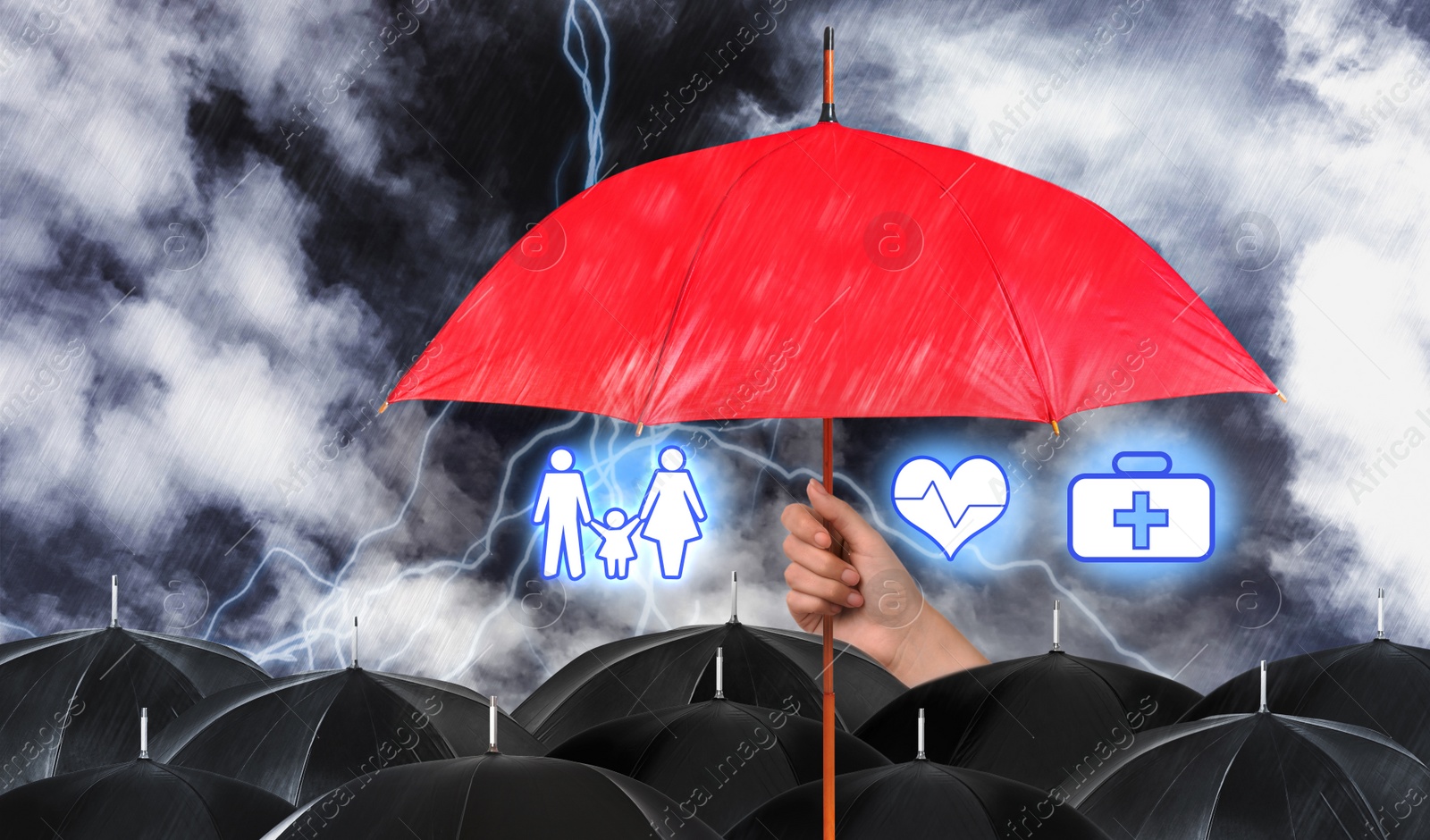 Image of Insurance agent covering illustrations with red umbrella during storm