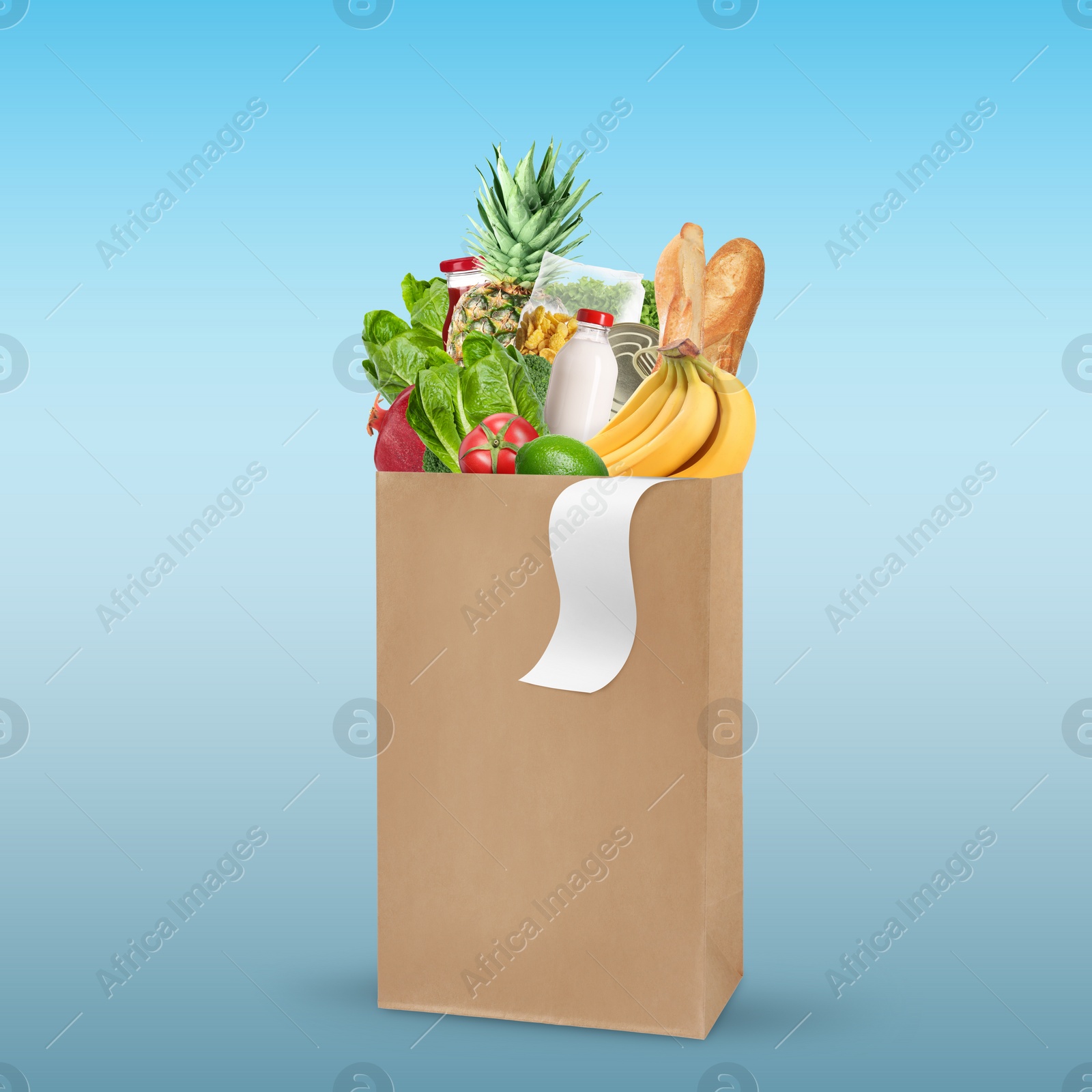 Image of Paper bag with different products and receipt on light blue background