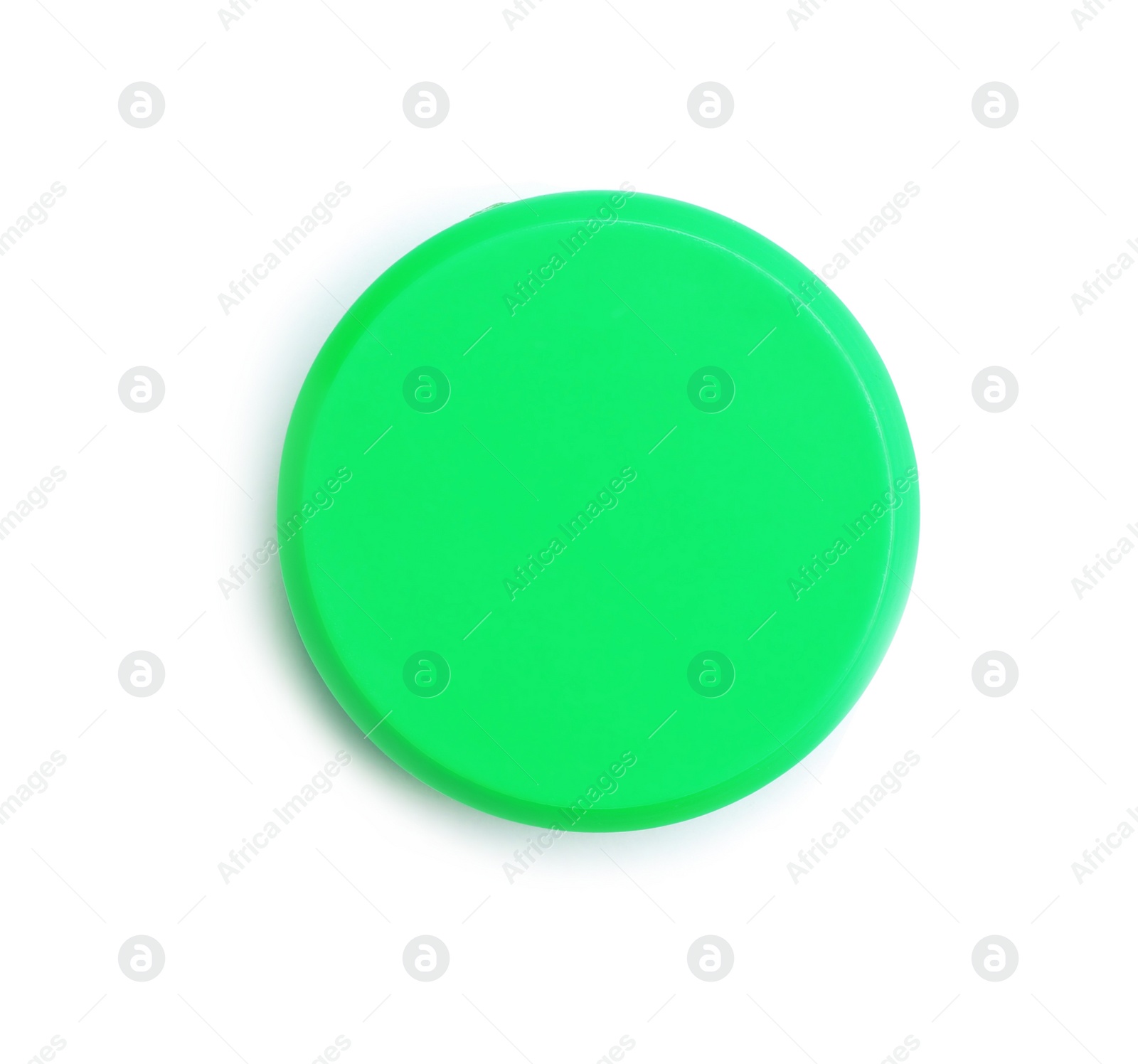 Photo of Bright green plastic magnet on white background, top view