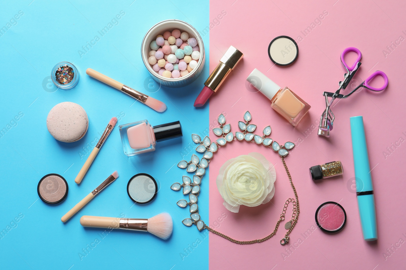 Photo of Flat lay composition with decorative cosmetics on color background