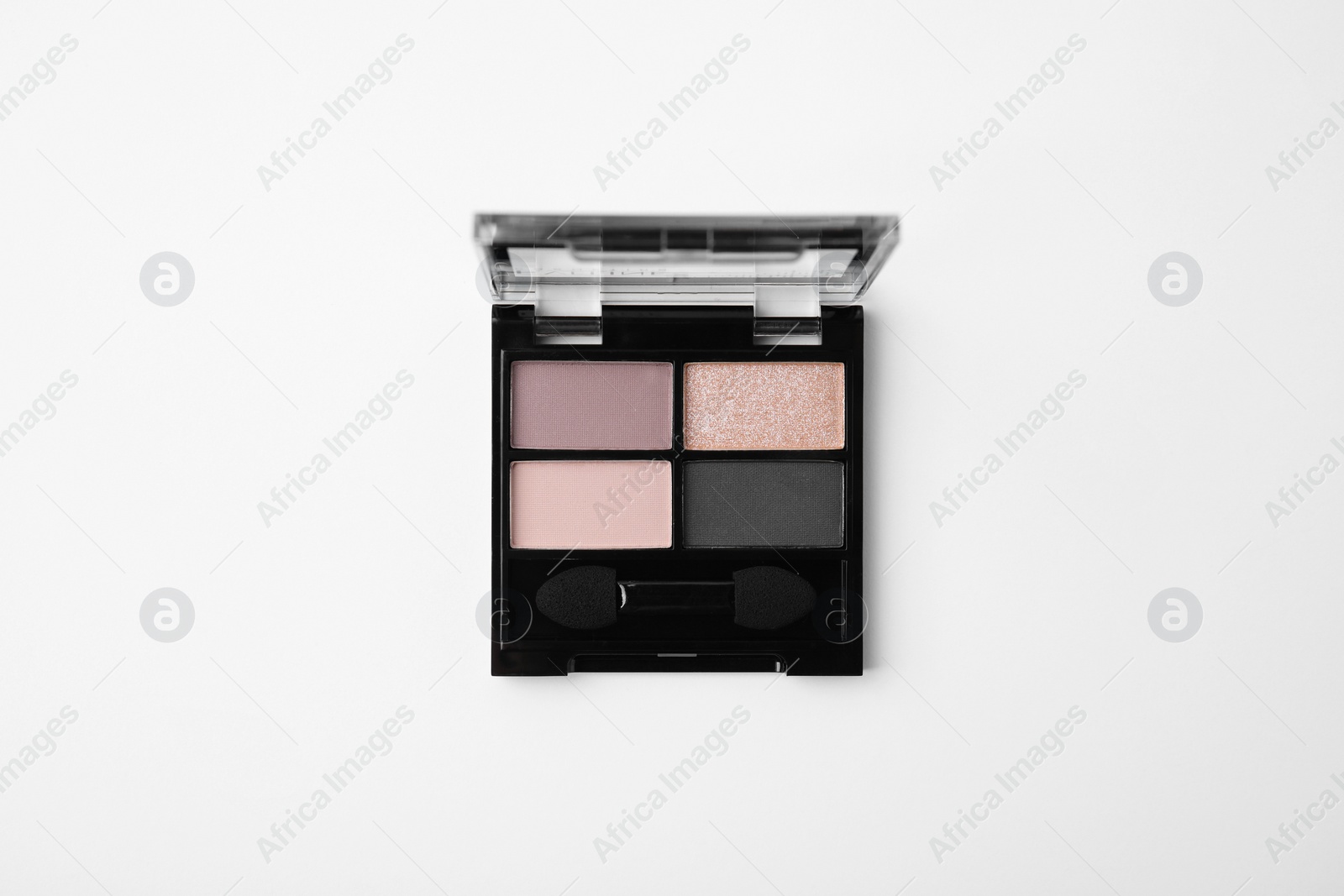 Photo of Eye shadow palette on white background, top view