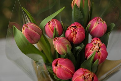 Photo of Beautiful bouquet of tulip flowers outdoors, closeup