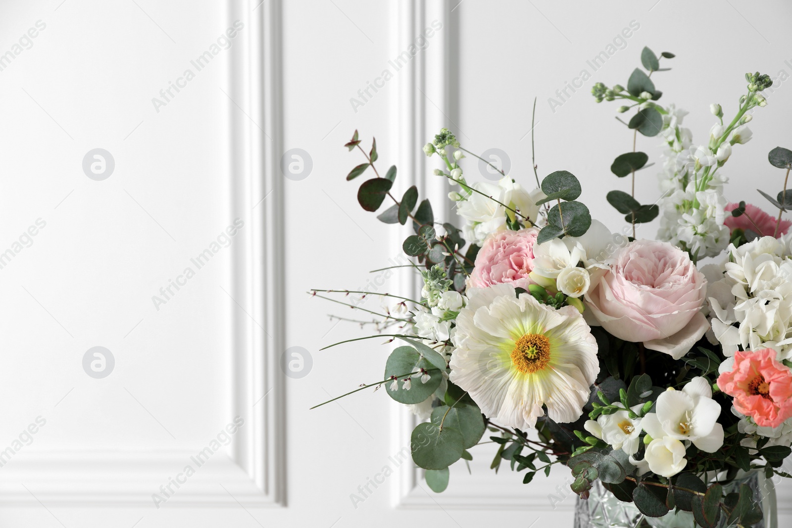 Photo of Bouquet of beautiful flowers on white background, closeup. Space for text