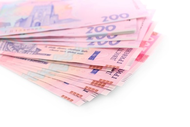 Photo of 200 Ukrainian Hryvnia banknotes on white background, closeup
