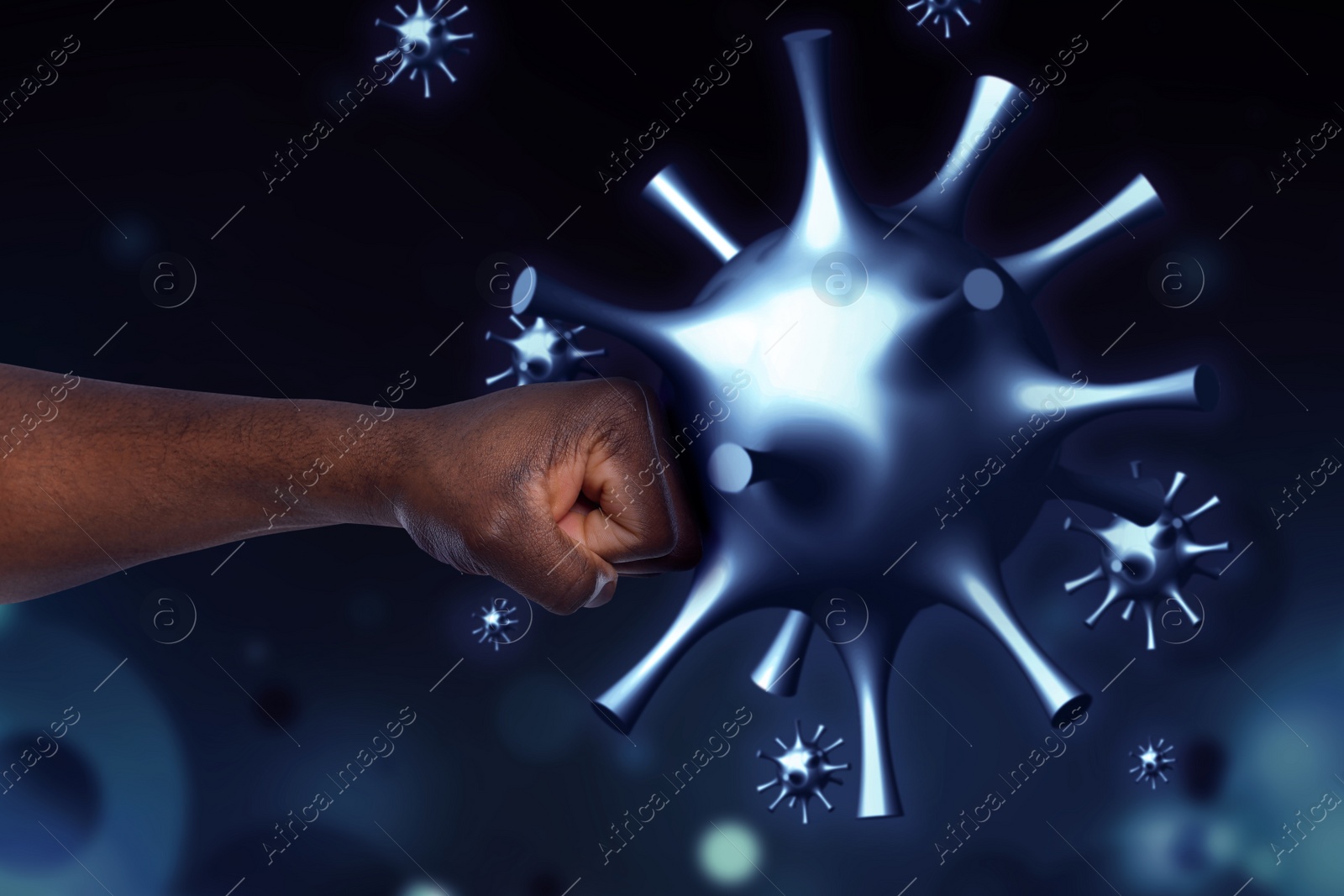 Image of Be healthy - boost your immunity to fight with illness. African American man showing clenched fist surrounded by viruses, closeup