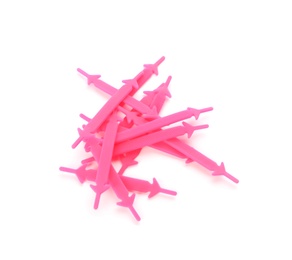 Photo of Pink silicone shoe laces on white background, top view
