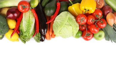 Heap of fresh ripe vegetables and fruits on white background, top view