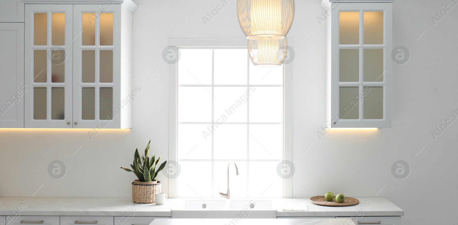 Image of New ceramic sink and modern tap in stylish kitchen interior. Banner design